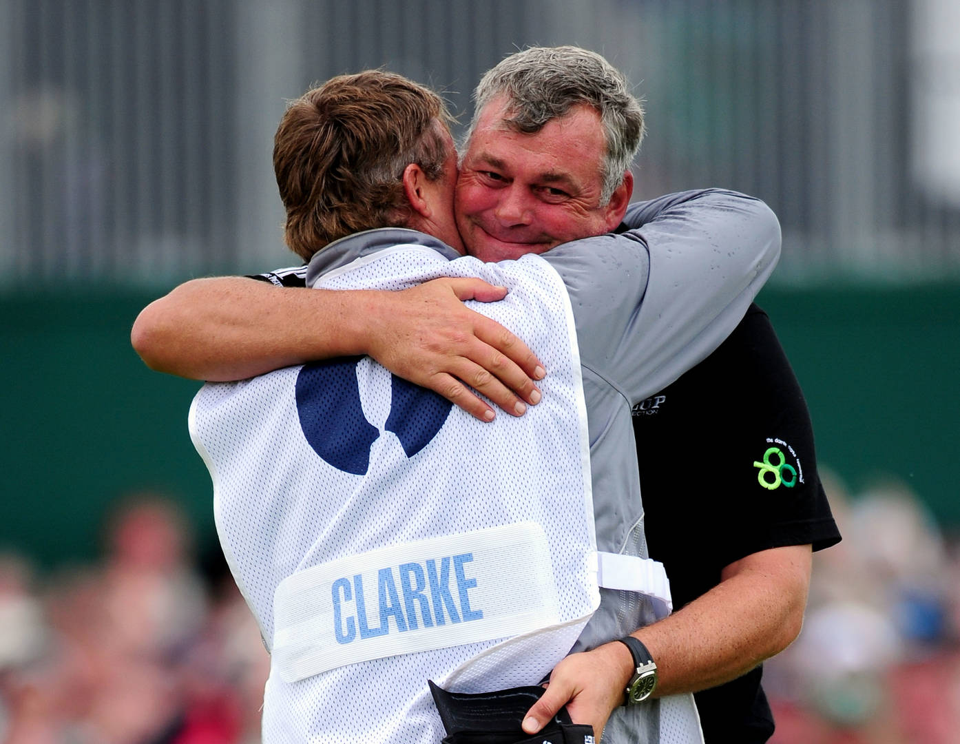Clarke hugs caddy